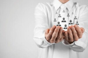 careful hands holding org chart