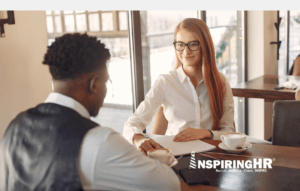 A boss and employee conducting one of her stay interviews